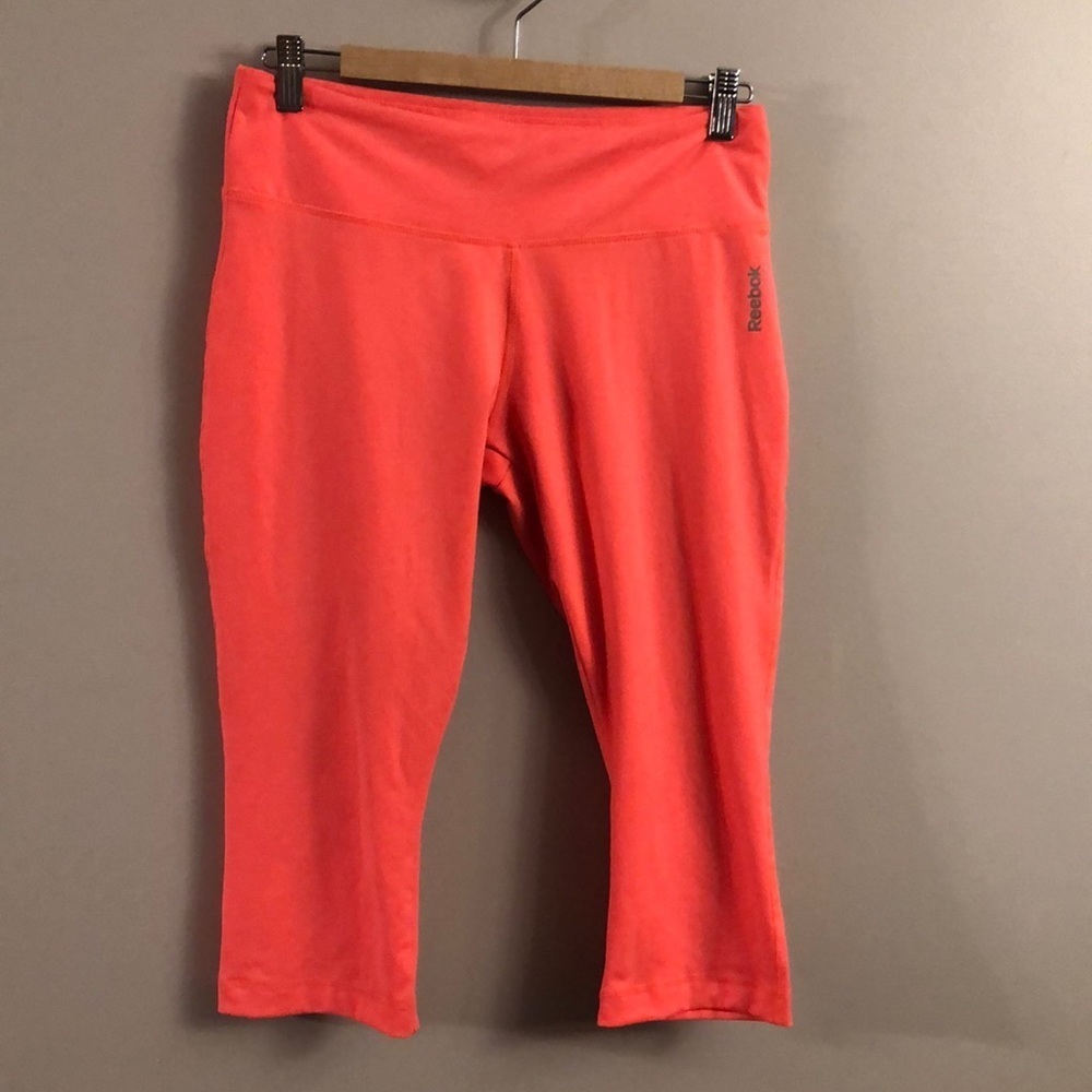 Reebok play dry cropped pants coral color